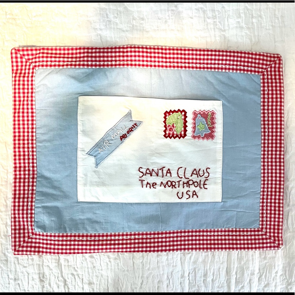 Pottery Barn Kids pillow with a pocket to put a letter to Santa in.